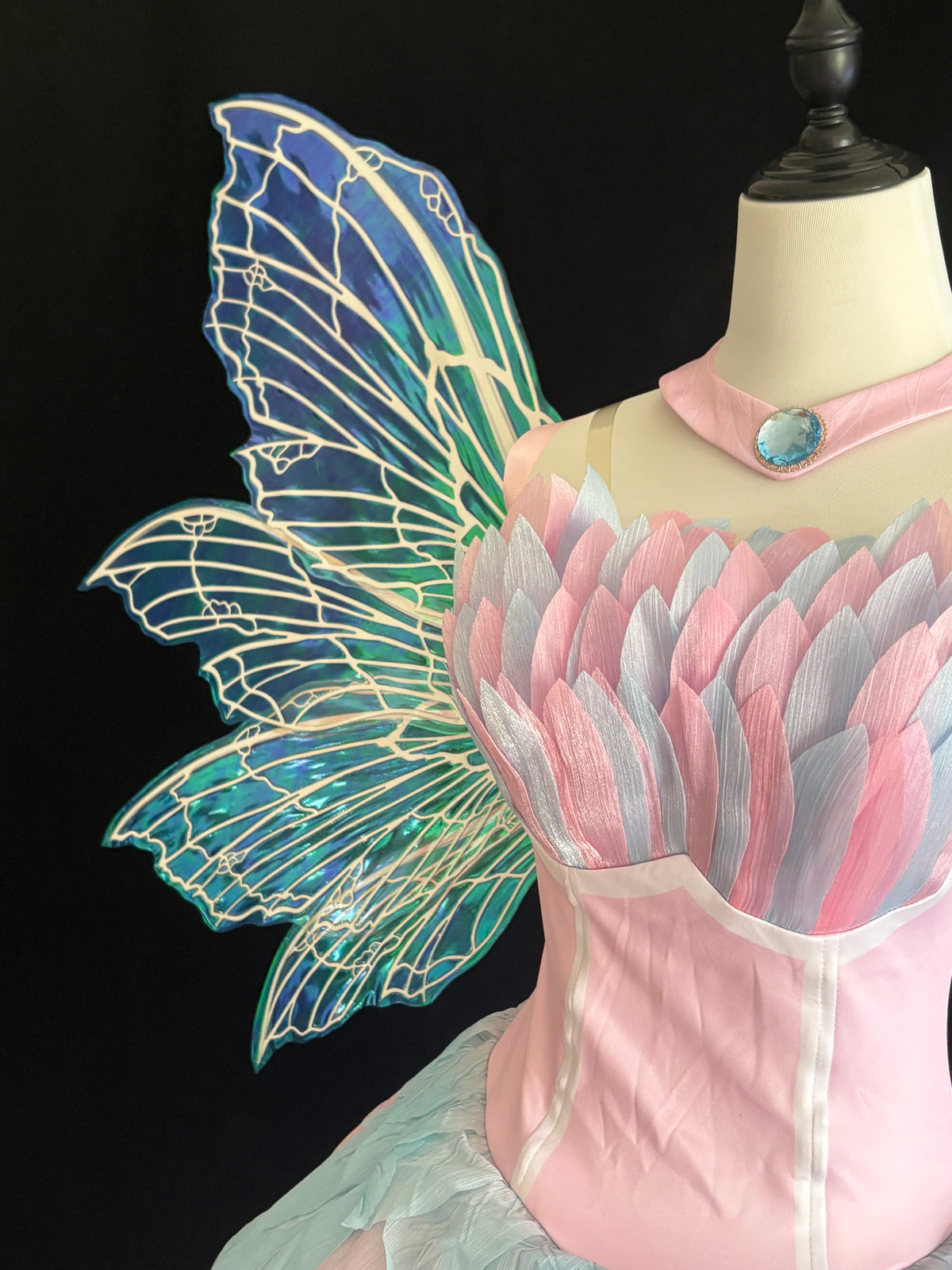 Iridescent blue purple and green color-shifting fairy cosplay wings with shoulder straps and decorative flowers
