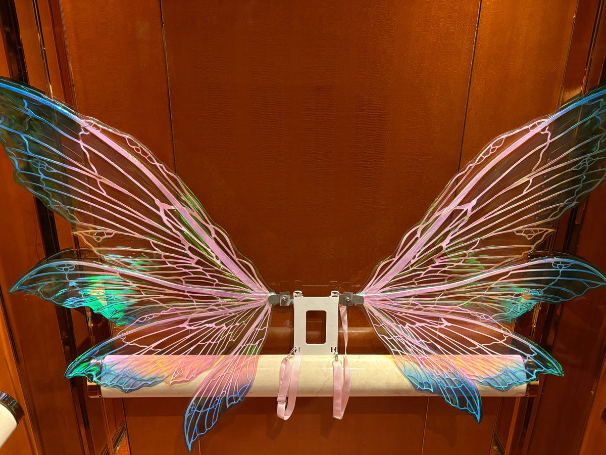 Iridescent blue purple and green color-shifting fairy cosplay wings with shoulder straps and decorative flowers
