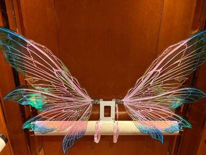 Iridescent blue purple and green color-shifting fairy cosplay wings with shoulder straps and decorative flowers
