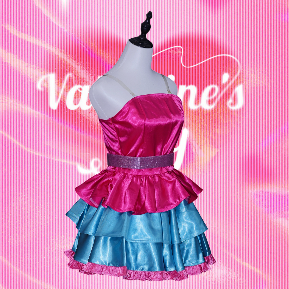 Full front view of the Barbie A Fairy Secret cosplay costume with pink and blue satin ruffles