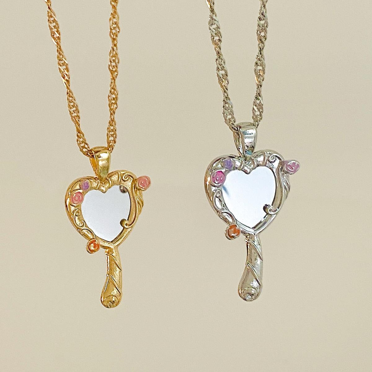 Barbie and the Diamond Castle heart mirror necklaces in gold and silver