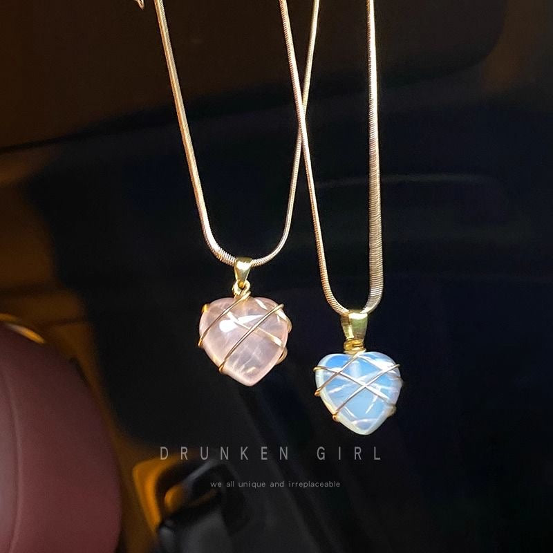 Barbie and the Diamond Castle heart necklaces with pink and blue crystal pendants