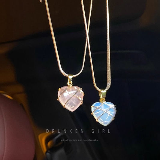 Barbie and the Diamond Castle heart necklaces with pink and blue crystal pendants