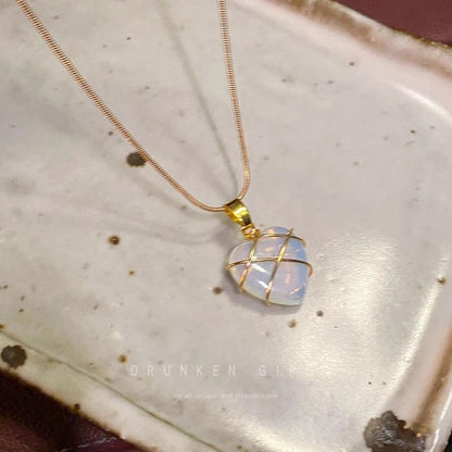 Pink and blue Barbie Diamond Castle heart necklace color options