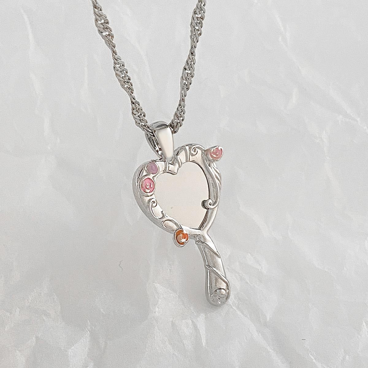 Silver-tone Barbie and the Diamond Castle heart mirror pendant necklace