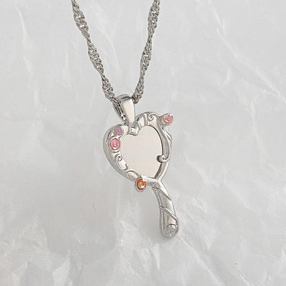 Silver-tone Barbie and the Diamond Castle heart mirror pendant necklace