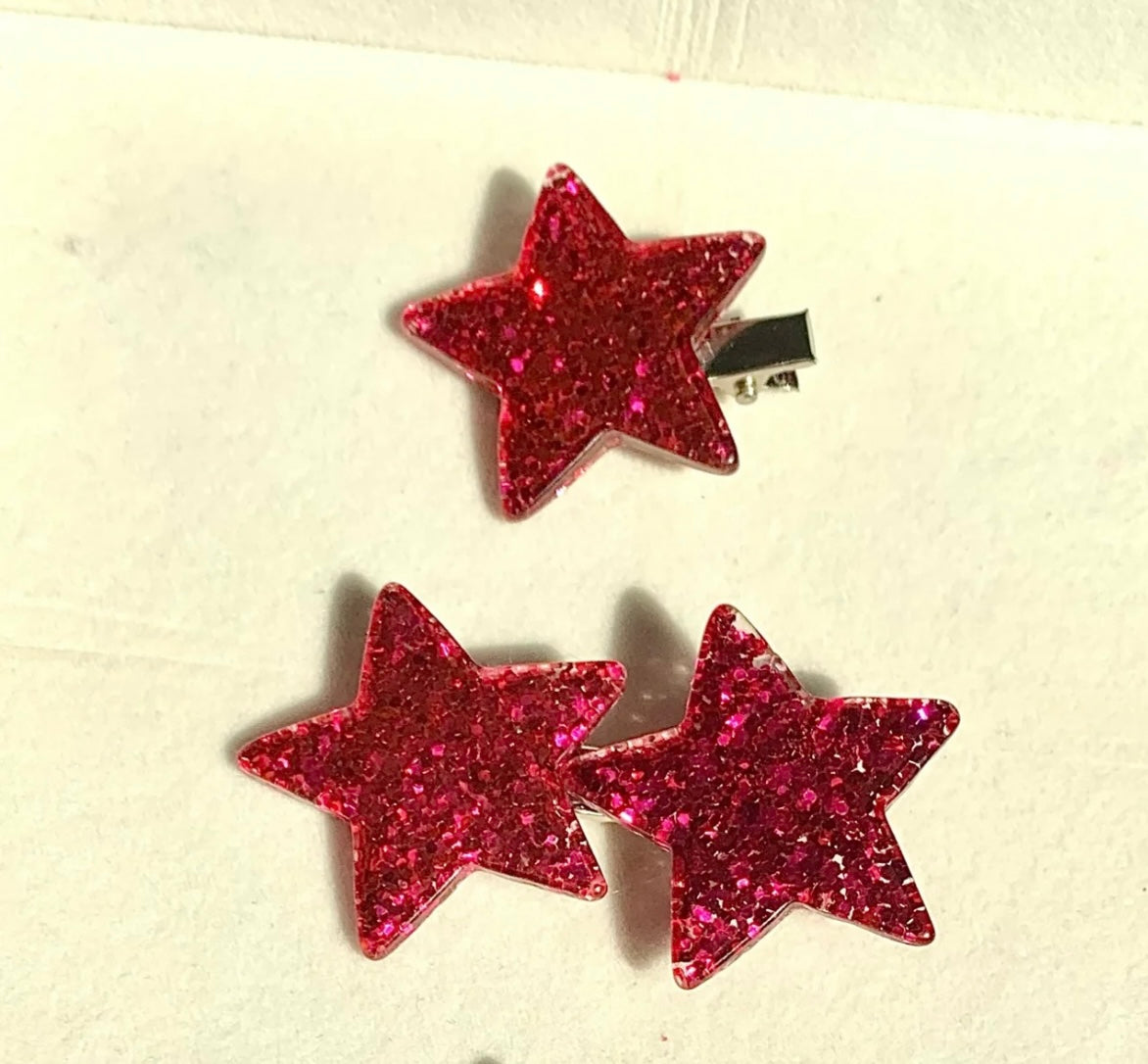 Close-up view of rhinestone pinky star decoration on pink princess