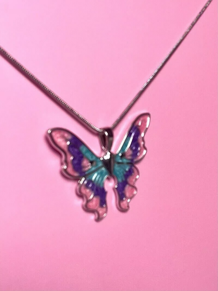 Front view of Barbie Fairytopia colorful butterfly pendant necklace