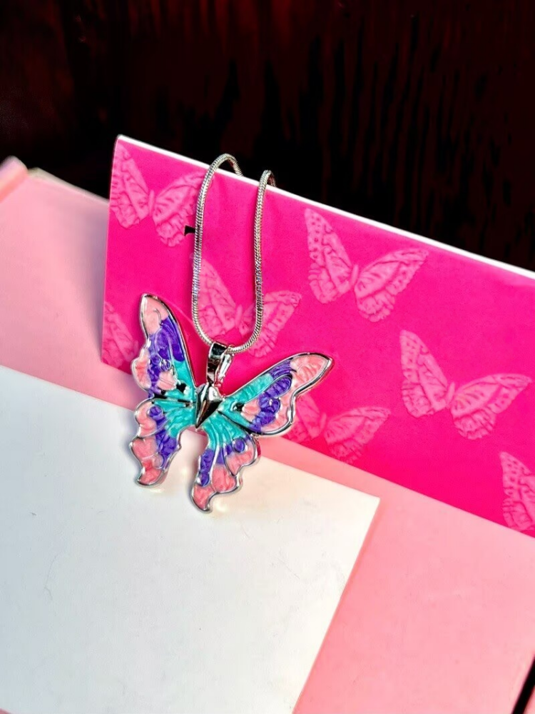 Barbie Fairytopia Magic of the Rainbow necklace set displayed in a pink gift box