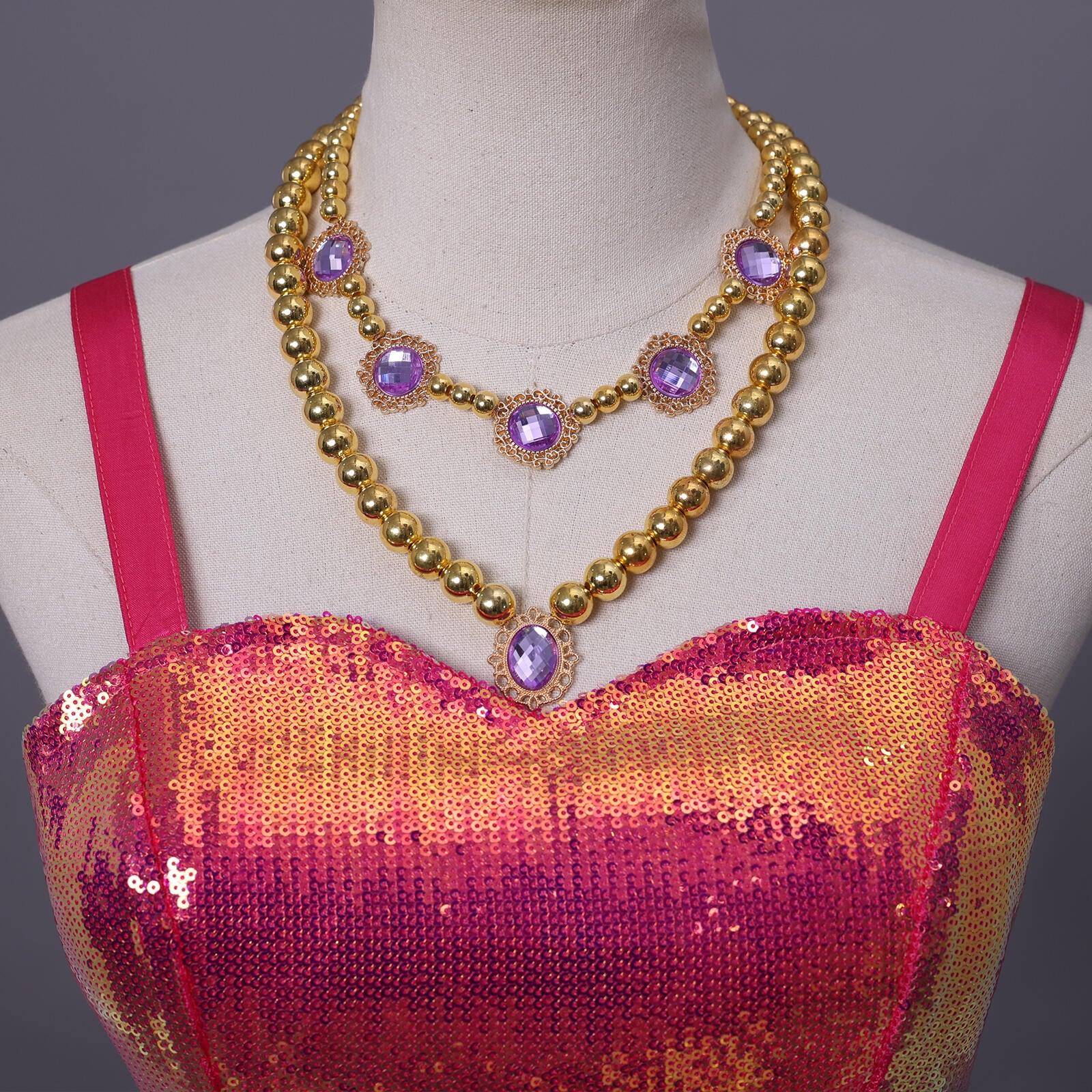 Close up of Barbie pink sequin cosplay dress with sparkling bodice details