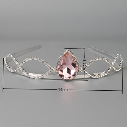 Silver-tone Barbie princess tiara with a pink teardrop gemstone