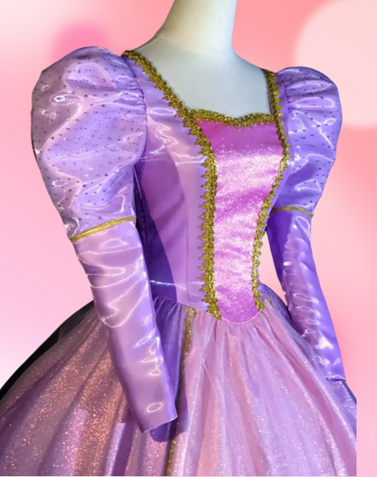 Close-up of the Barbie Rapunzel cosplay dress with puff sleeves and detailed purple bodice
