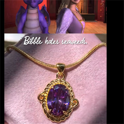 Close-up of Barbie Rapunzel cosplay necklace with a gold-tone frame and purple gemstone