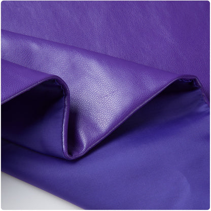 Close-up of the textured purple jacket fabric with a glossy finish