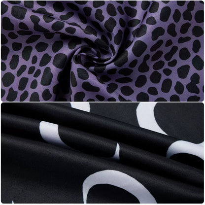 Close-up of purple leopard-print skirt fabric and black crescent-moon print top fabric