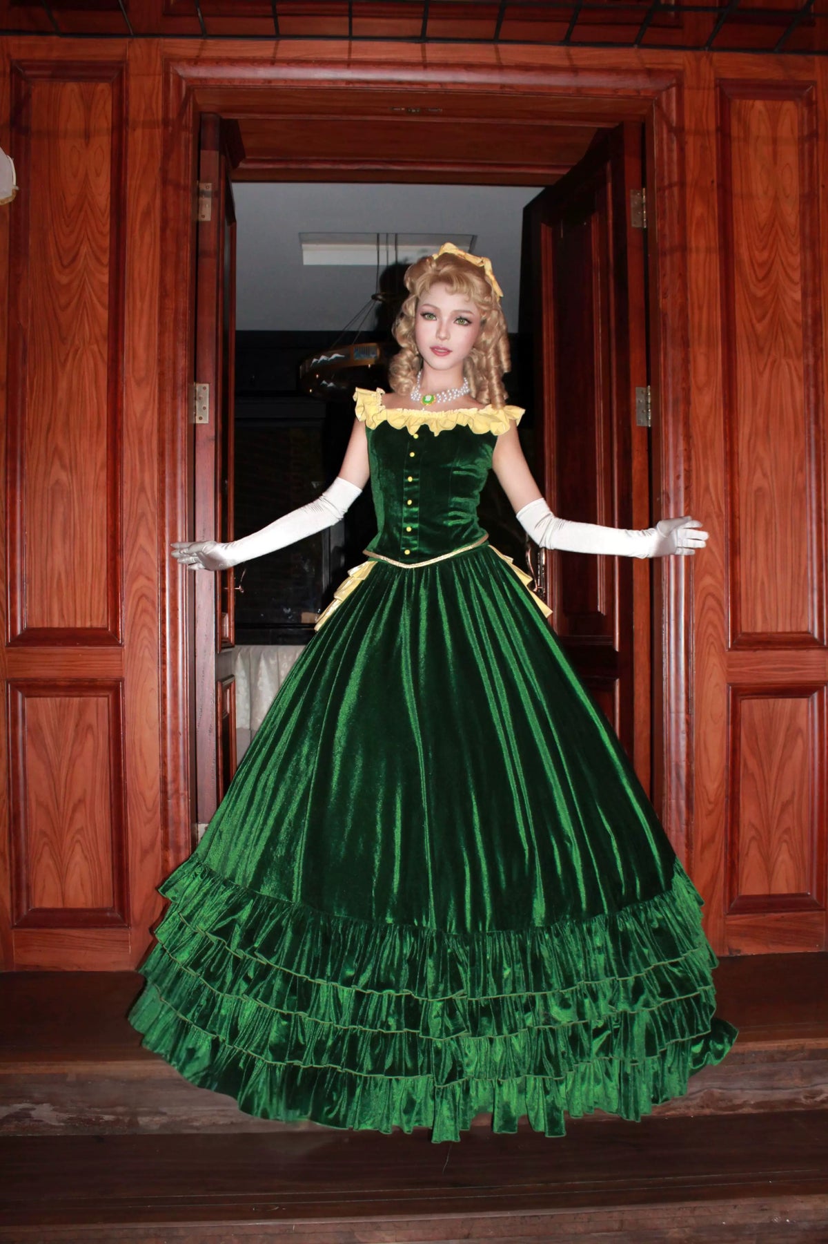Front view of a model wearing the Eden Starling green cosplay dress
