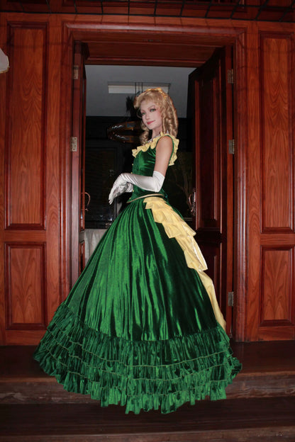 Side view of the Eden Starling Victorian-style green dress