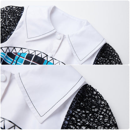 Close-up of the white pointed collar and black lace shoulders on a blue plaid dress