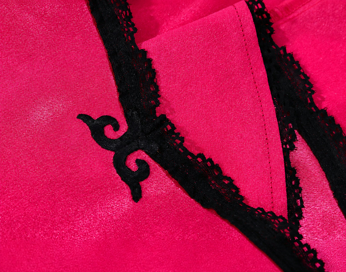 Black decorative trim detail on fuchsia butterfly fairy costume