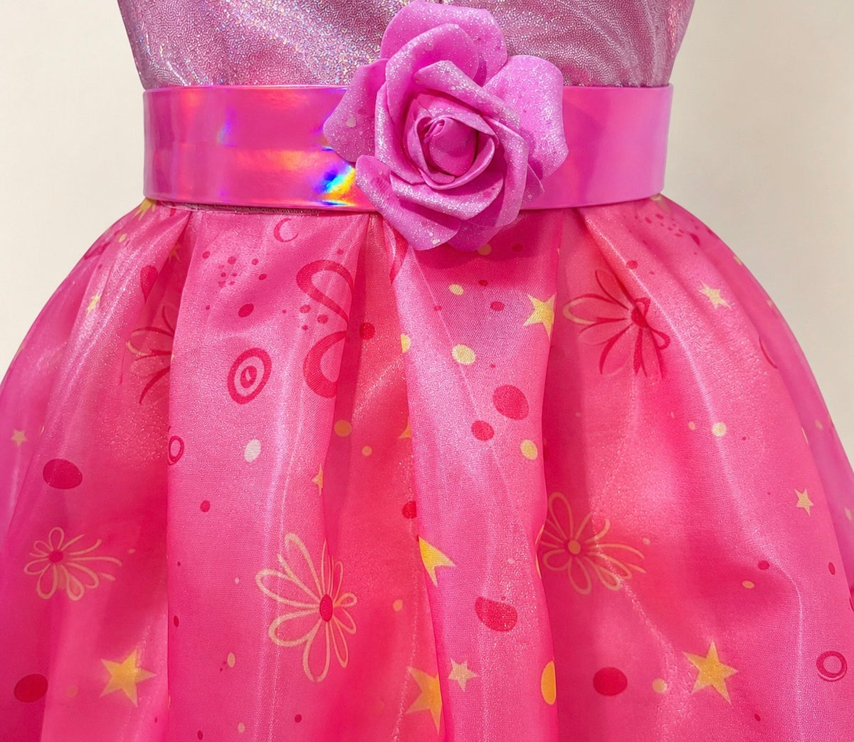 Close-up of the satin waistband and pink rose decoration on the Princess Alexa dress