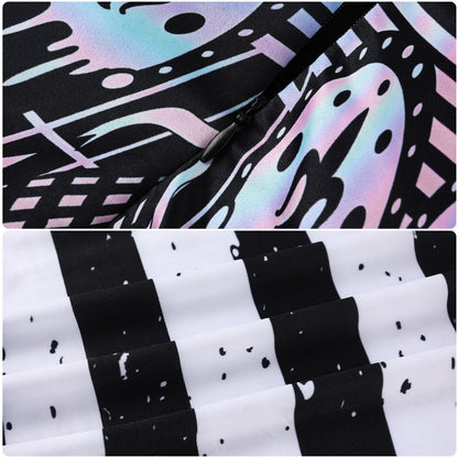 Close-up of pastel gothic skirt motifs and speckled black and white striped fabric