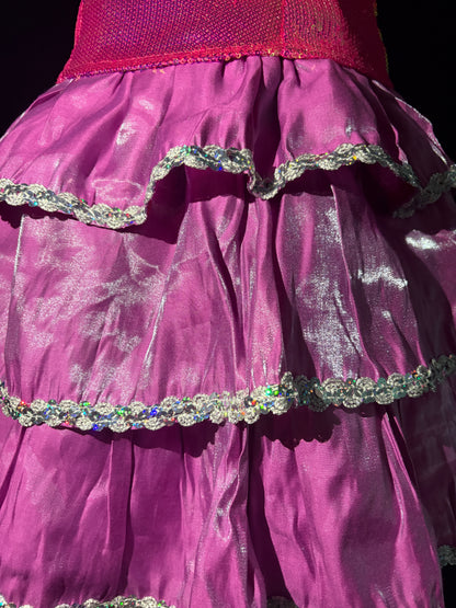 Layered pink and purple ruffle detail of cosplay dress