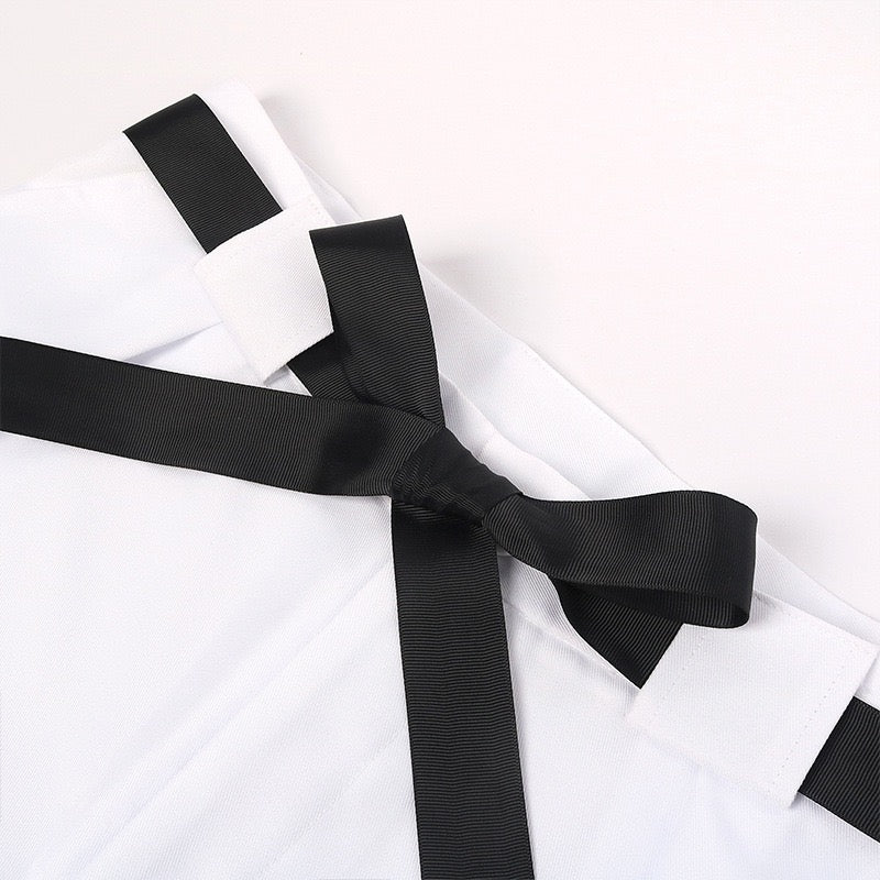 Close-up of the black waist belt tied at the front of the white Toji Fushiguro cosplay pants