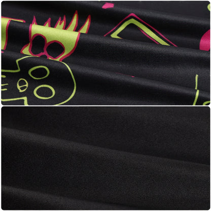 Black top fabric with bright pink, green and yellow graphic prints