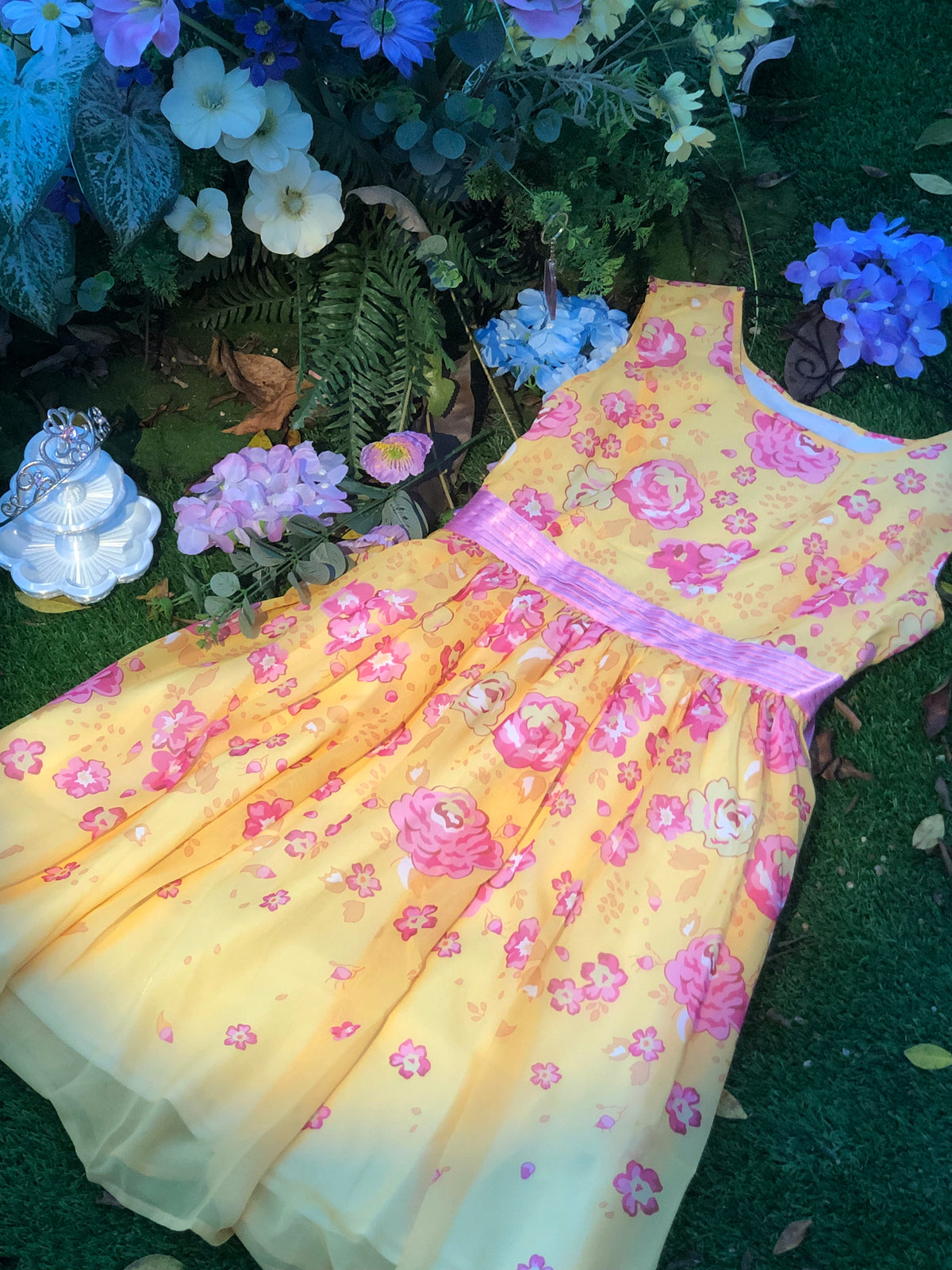 Yellow floral fairytale dress flat lay with floral details